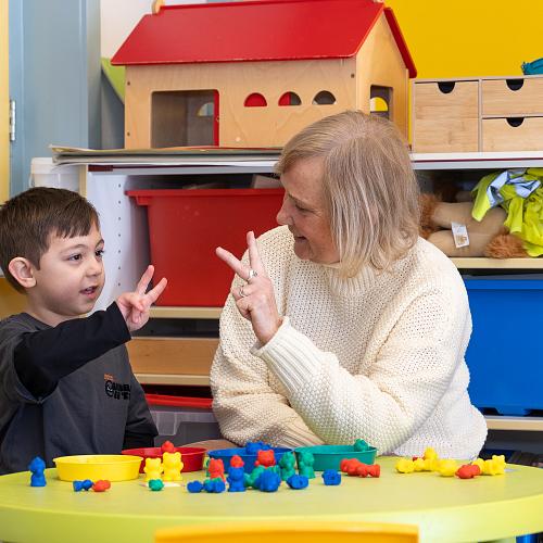 Leerkracht en leerling SCOH 